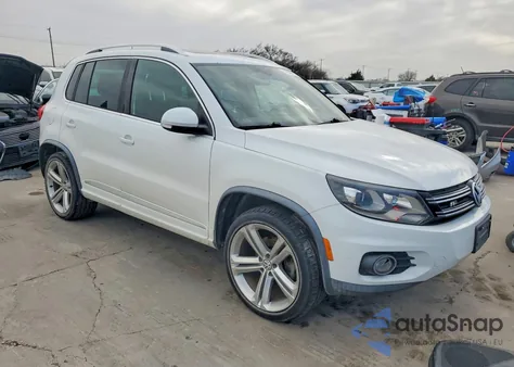 2014 Volkswagen Tiguan S z USA, uszkodzony, nr VIN WVGAV3AX7EW058433